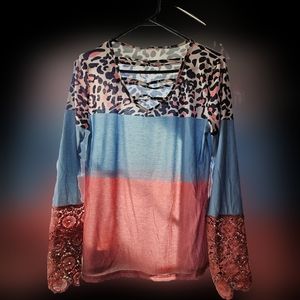 Beautiful blouse with animal print and crochet bell sleeves